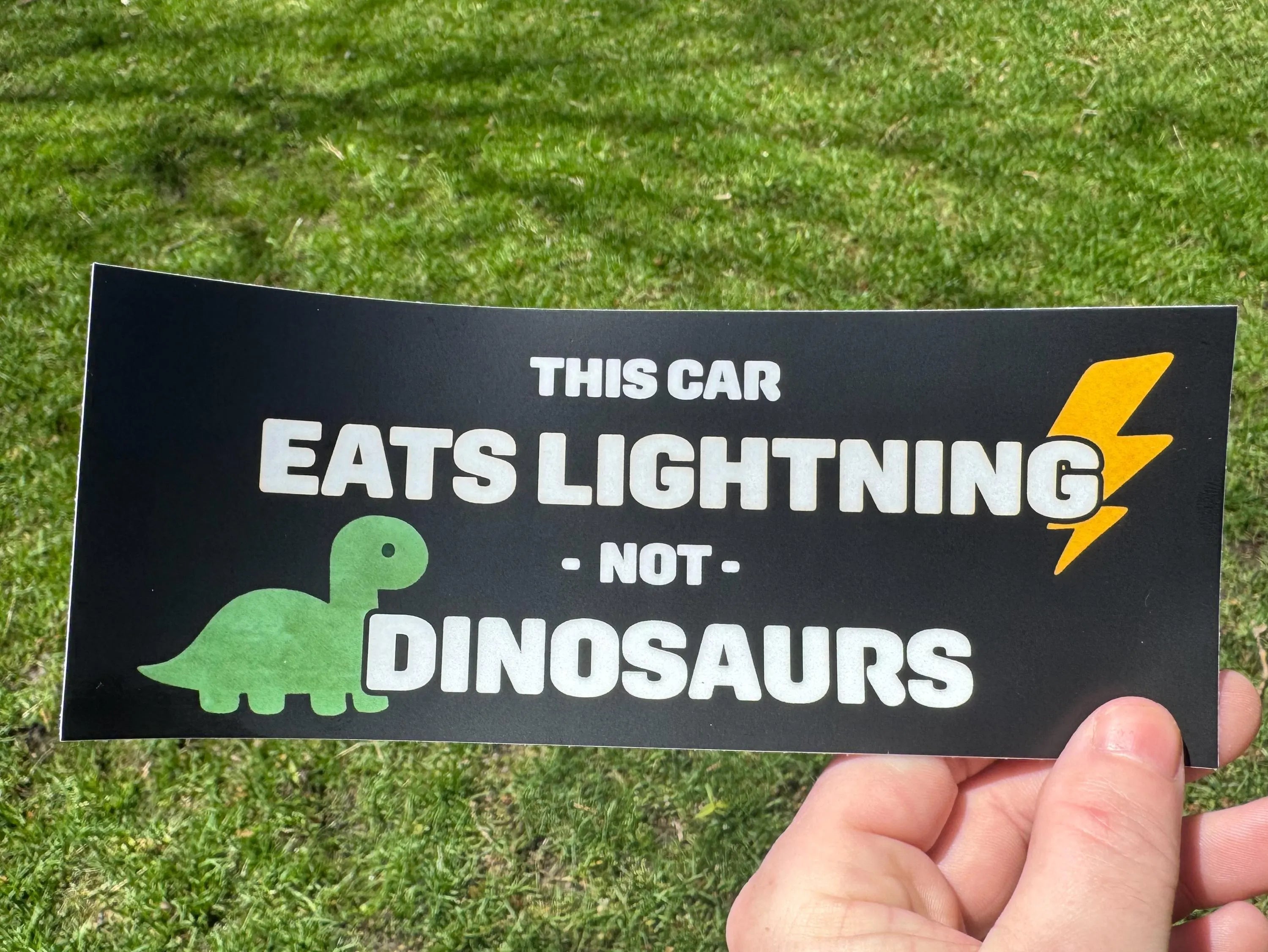 Electric Car Bumper Sticker • “This Car Eats Lightning Not Dinosaurs” • EV Clean‑Energy Vinyl Decal