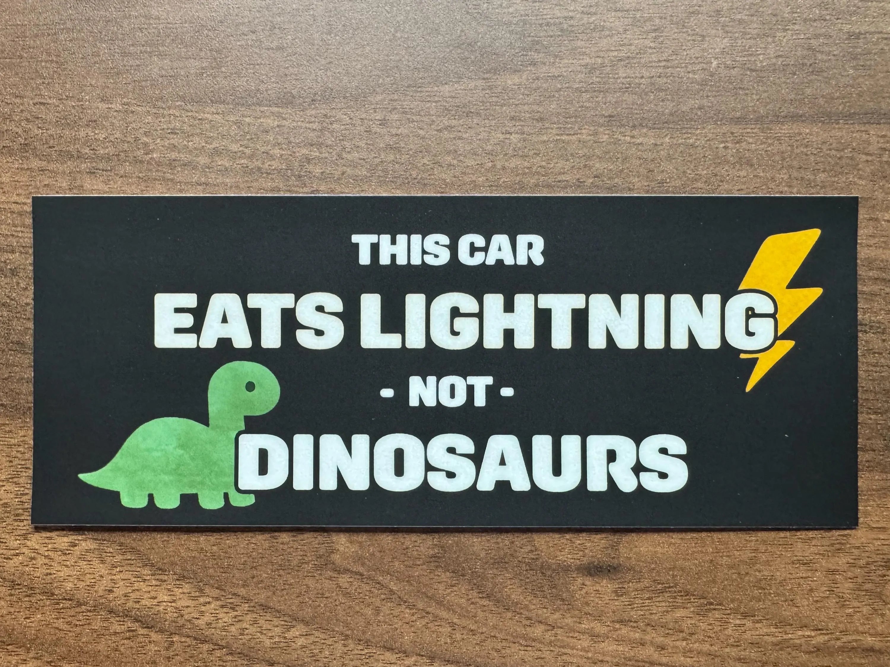 Electric Car Bumper Sticker • “This Car Eats Lightning Not Dinosaurs” • EV Clean‑Energy Vinyl Decal